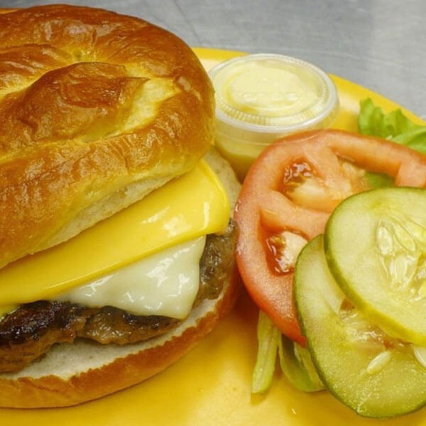 cheeseburger on a grilled bun
