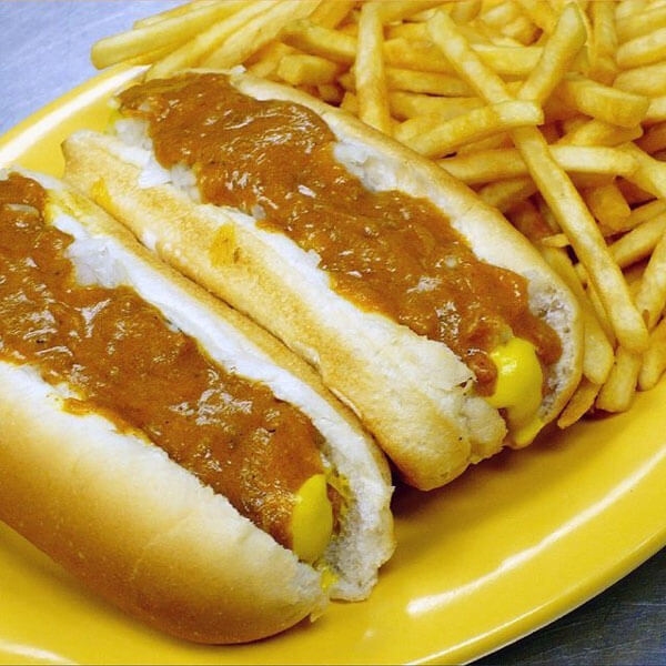 two coney dogs with cheese and a side of fries