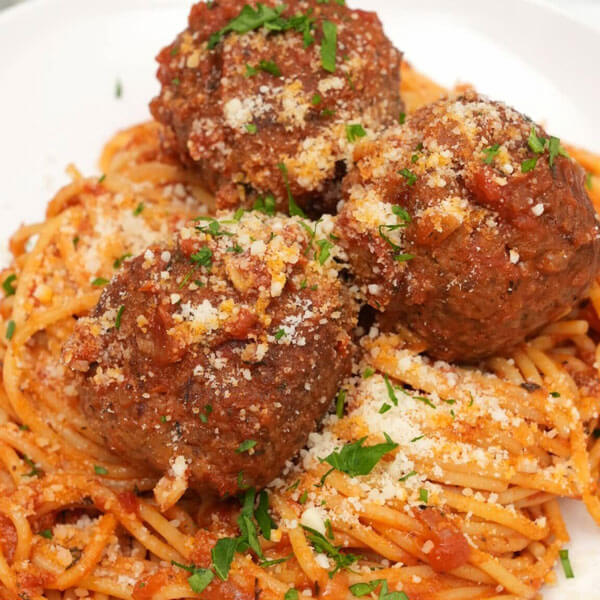 close up of spaghetti and meatballs
